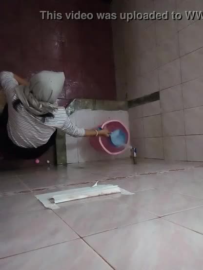 Hijab Girl On Campus Toilet
