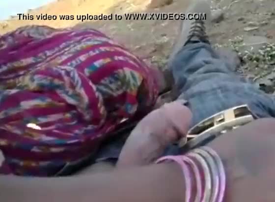 Indian desi village aunty sucking a stanger cock at outdoor